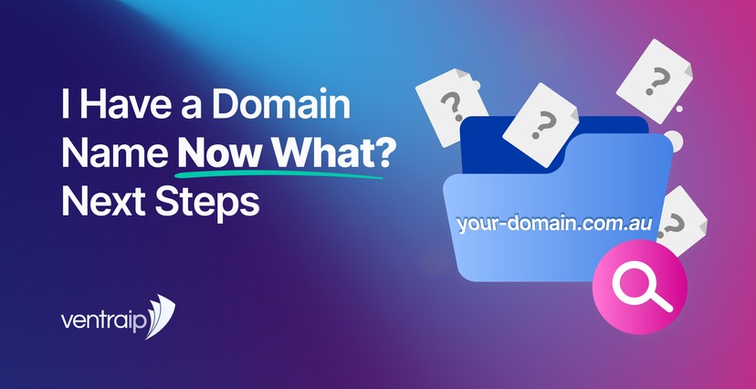 Illustration for a VentraIP blog post titled “I Have a Domain Name Now What? Next Steps”, featuring a folder labelled your-domain.com.au with question mark documents and a search icon on a blue, purple and pink gradient background.